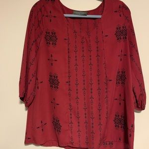 Red patterned blouse